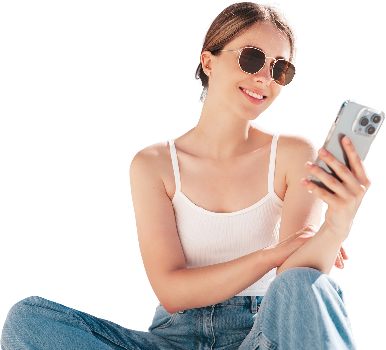 Woman in sunglasses sitting and holding a phone